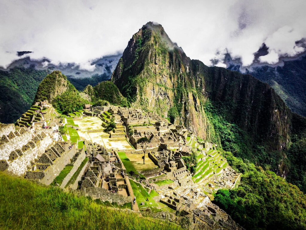 Machu Picchu on a sunny, yet cloudy day.