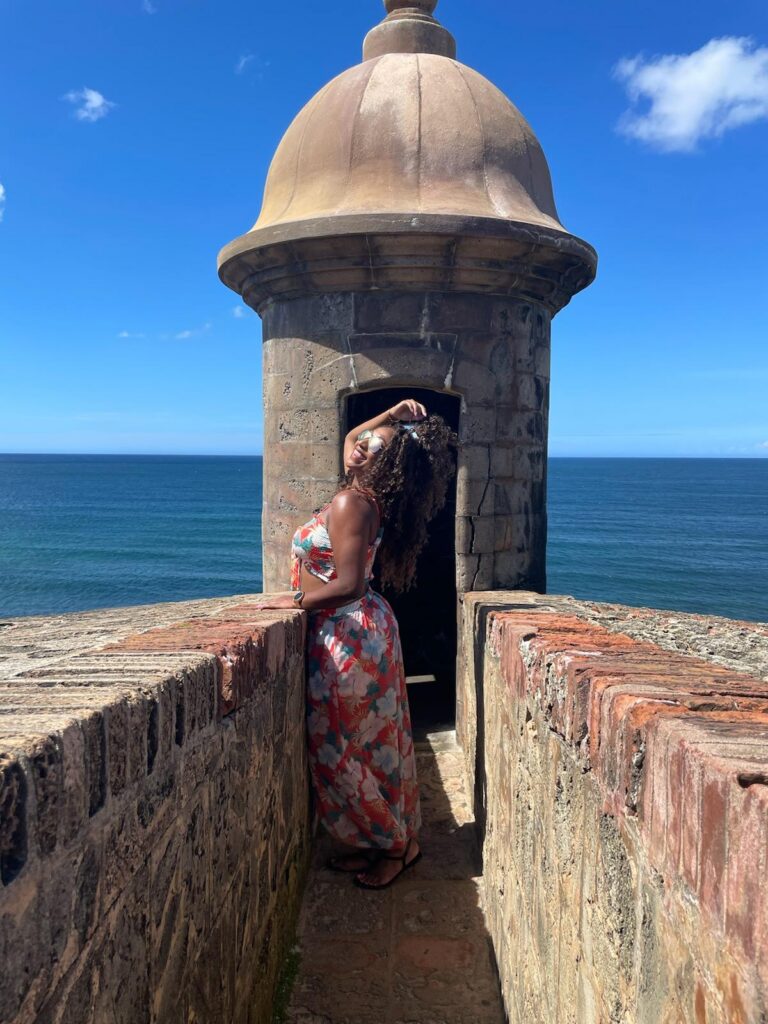 Travel Britten founder Brittney exploring the historic Castillo San Felipe del Morro in San Juan, Puerto Rico