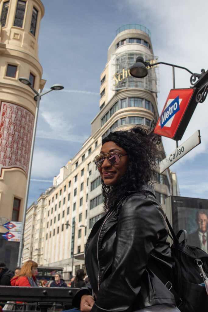Traveler exploring Callao in Madrid, Spain