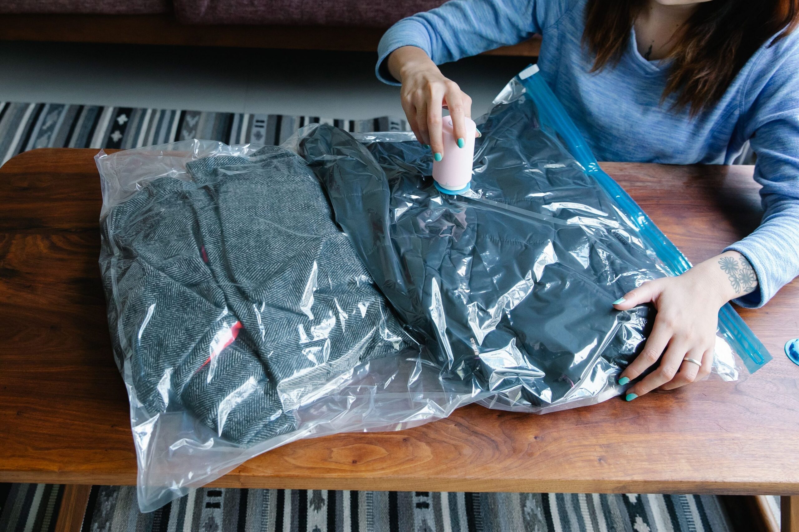 Travel packing tips for organizing a suitcase i.e. using compression bags