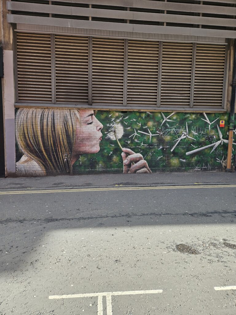 Colorful street art mural in Glasgow, Scotland