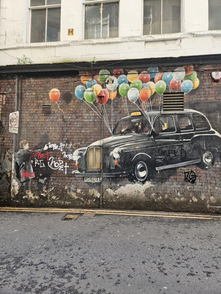 Colorful street art mural in Glasgow, Scotland